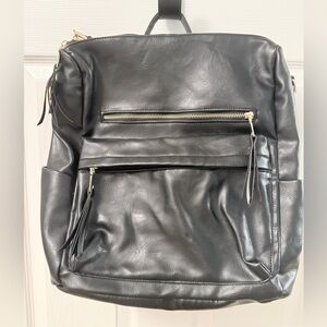 Black Leather Modern + Chic Bag backpack EUC. Lined w/purple. Looks New!